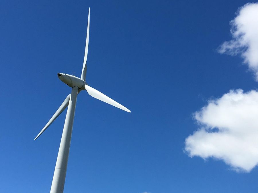 Looking up at a windmill